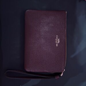 Coach Dark Wine Wristlet with Gold Accents. NWOT